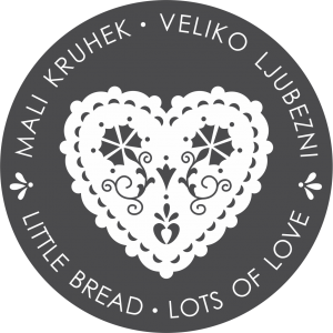 logo Mali kruhek veliko ljubezni bela na sivi